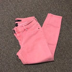 Pinkish orange skinny jeans